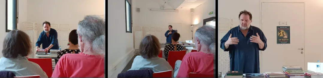 David Fournol présente ses romans policiers au public de la salle d'animation, une table de livres devant lui