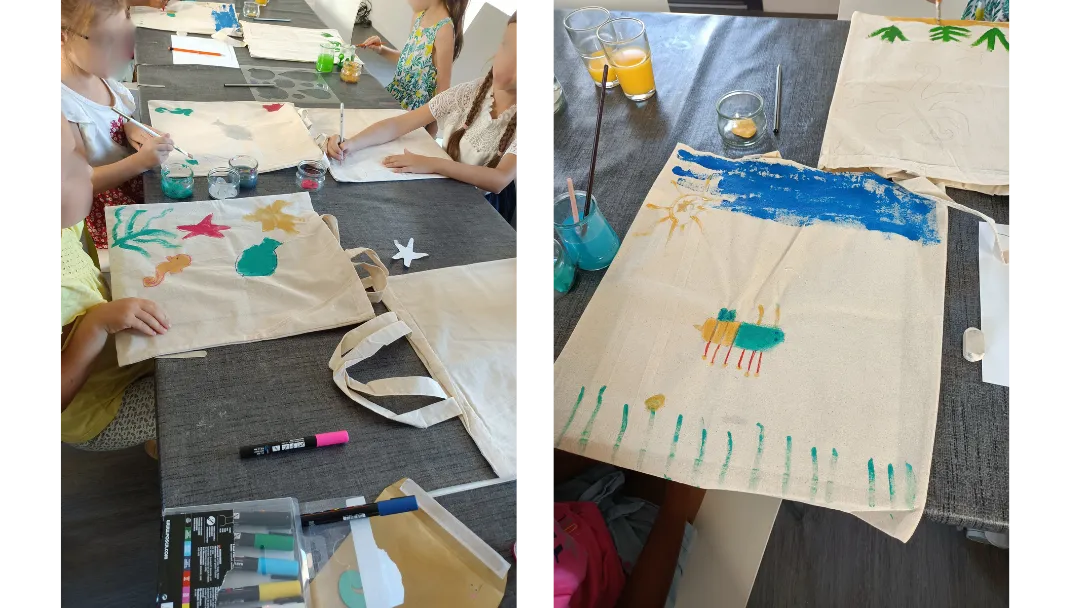 Enfants faisant de la peinture sur tissus lors des ateliers créatif organisés à la médiathèque de Saint-Symphorien